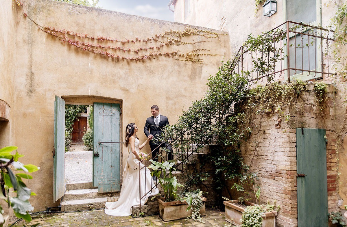 Stunning stairs with a wedding couple in Siena