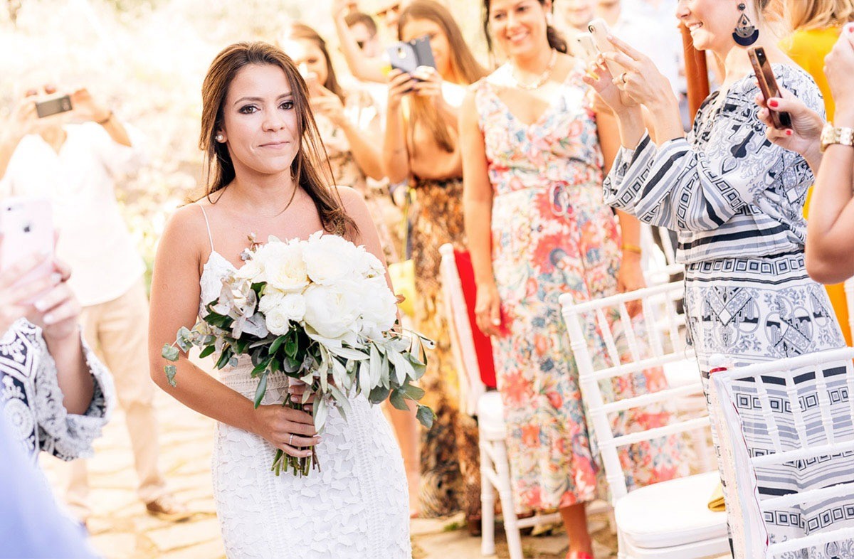 Bride walking through the aisle in Monterosso al Mare